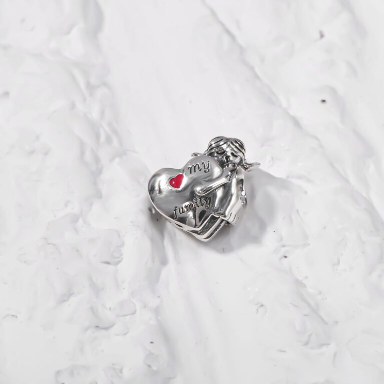 Family with heart and cute baby  Silver Charm.