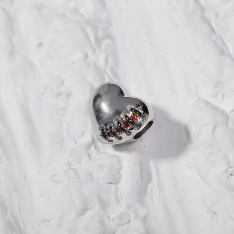 Stiched heart Silver Charm