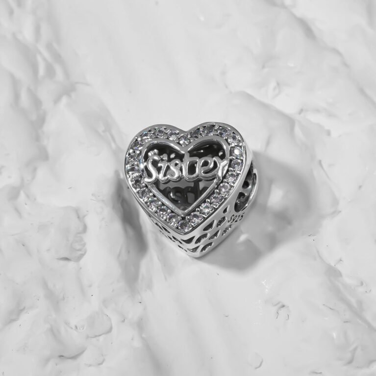 Sister charm on a heart  Silver Charm.