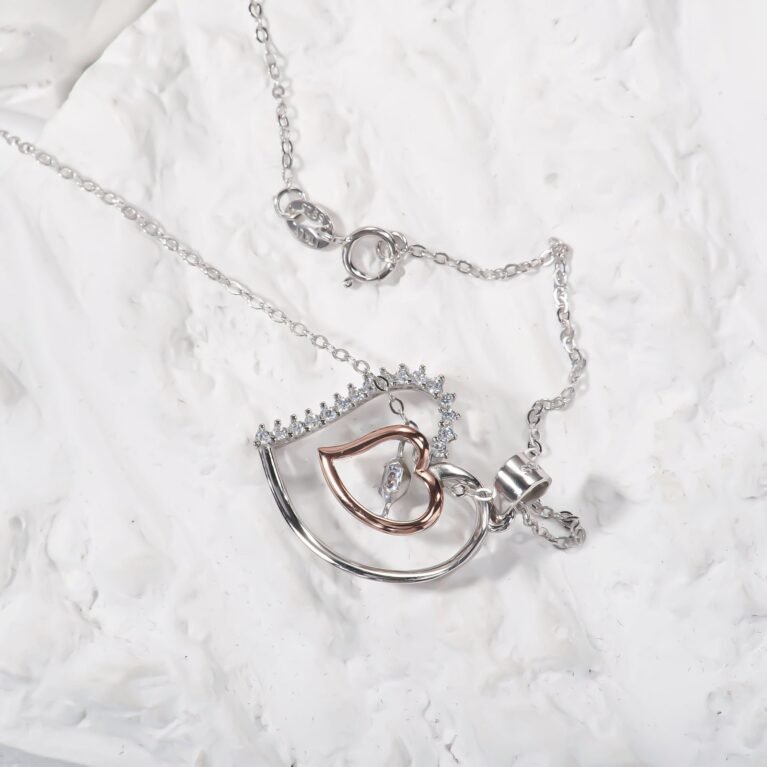 2 Hearts one in each other Necklace.