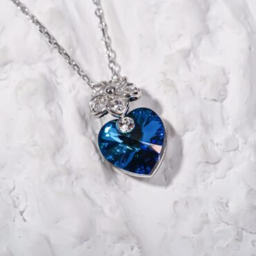 Blue Heart with Flower Necklace .
