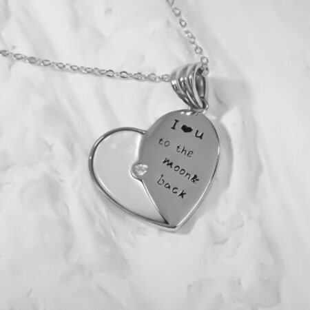 Heart with text Love to the Moon Necklce.