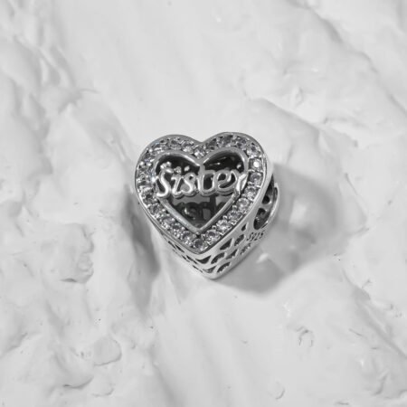 Sister charm on a heart  Silver Charm.